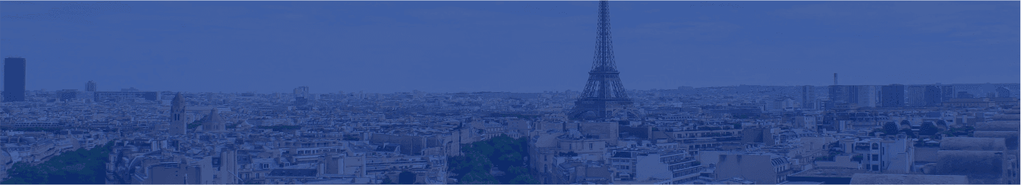 A monochromatic blue-filtered skyline of a bustling city with modern skyscrapers and iconic architecture.